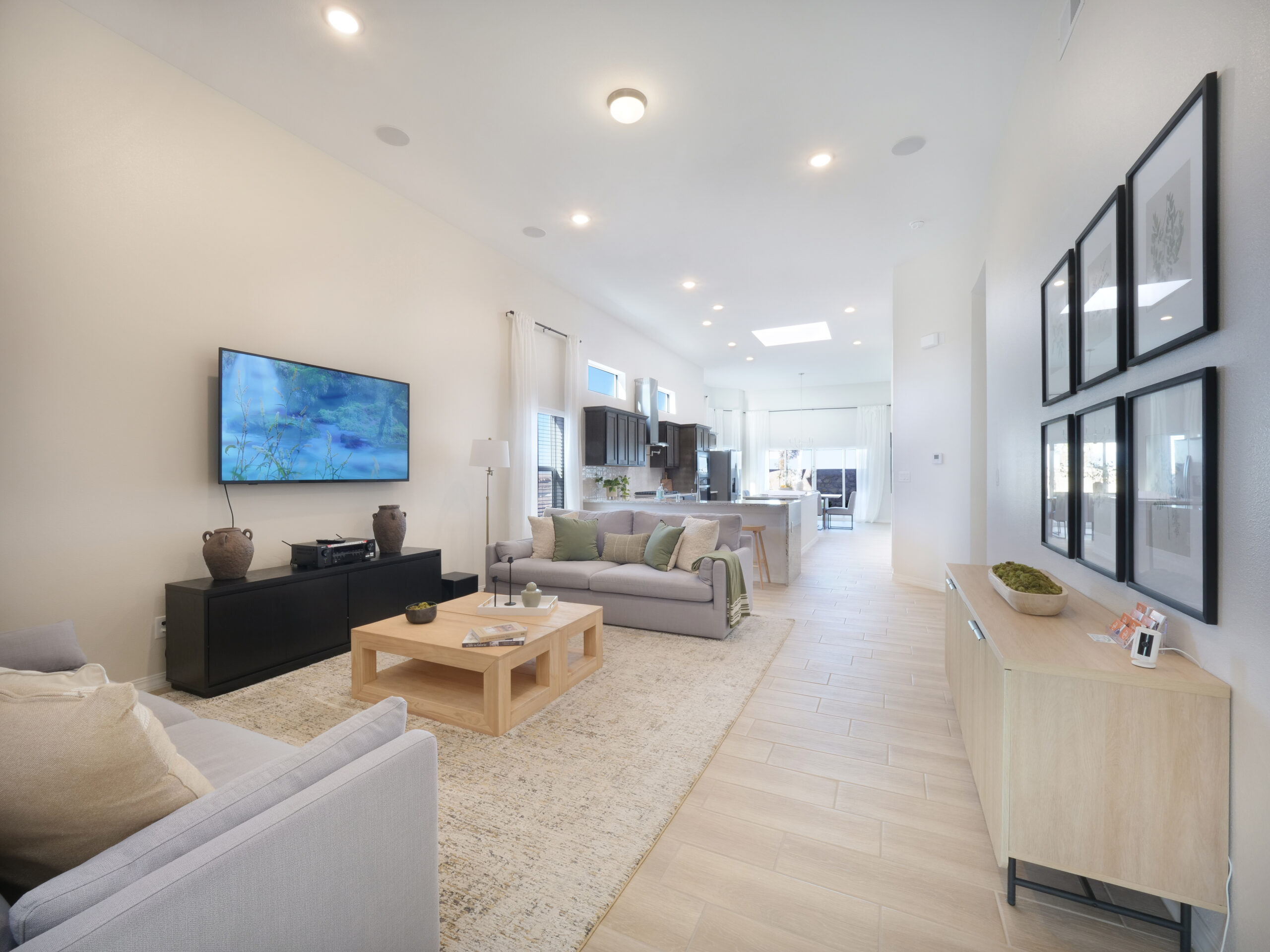Spacious living room in The Rose model by Zia Homes with open-concept layout and natural light.