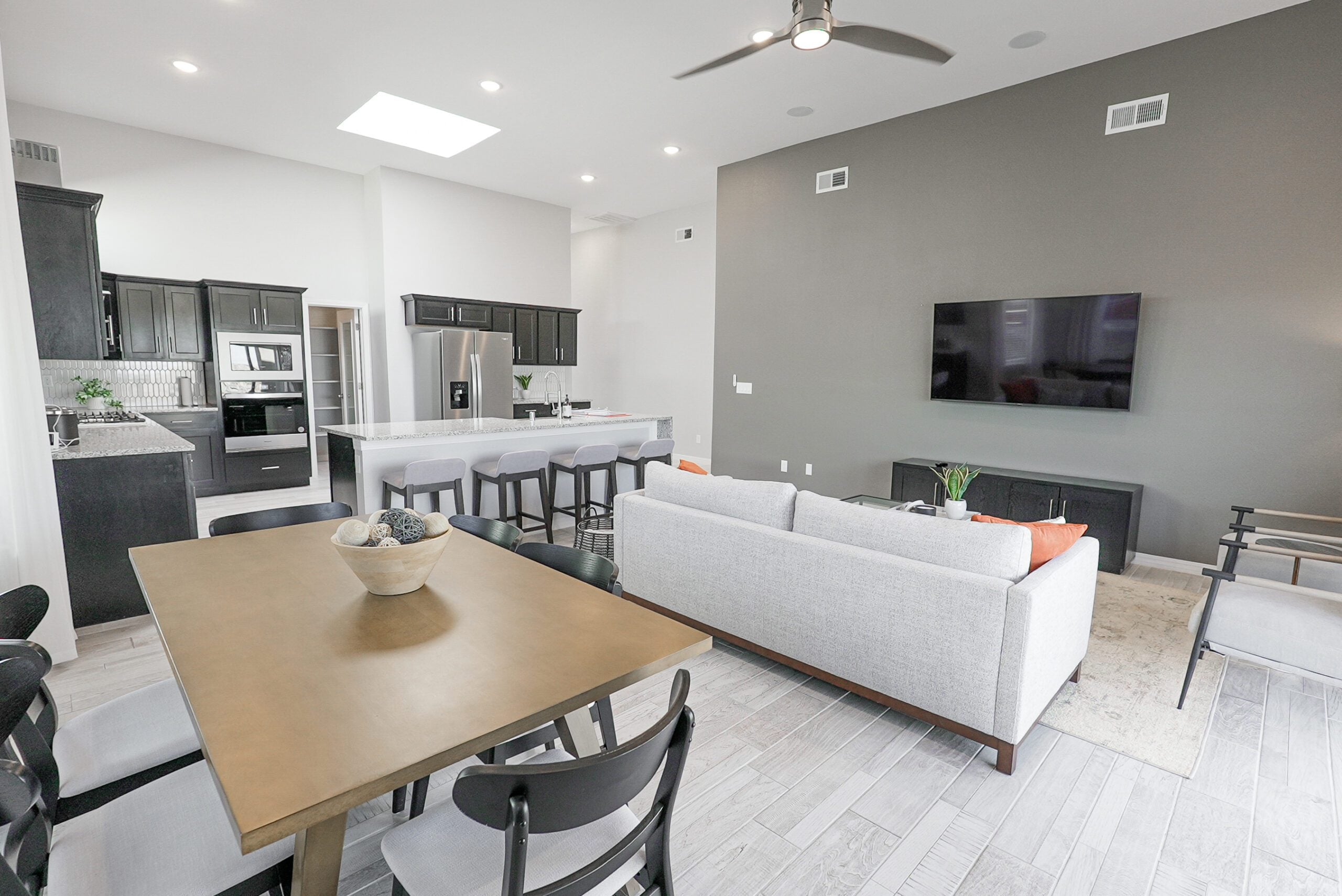 The Orchid Open Concept with modern finishes in the living room and kitchen