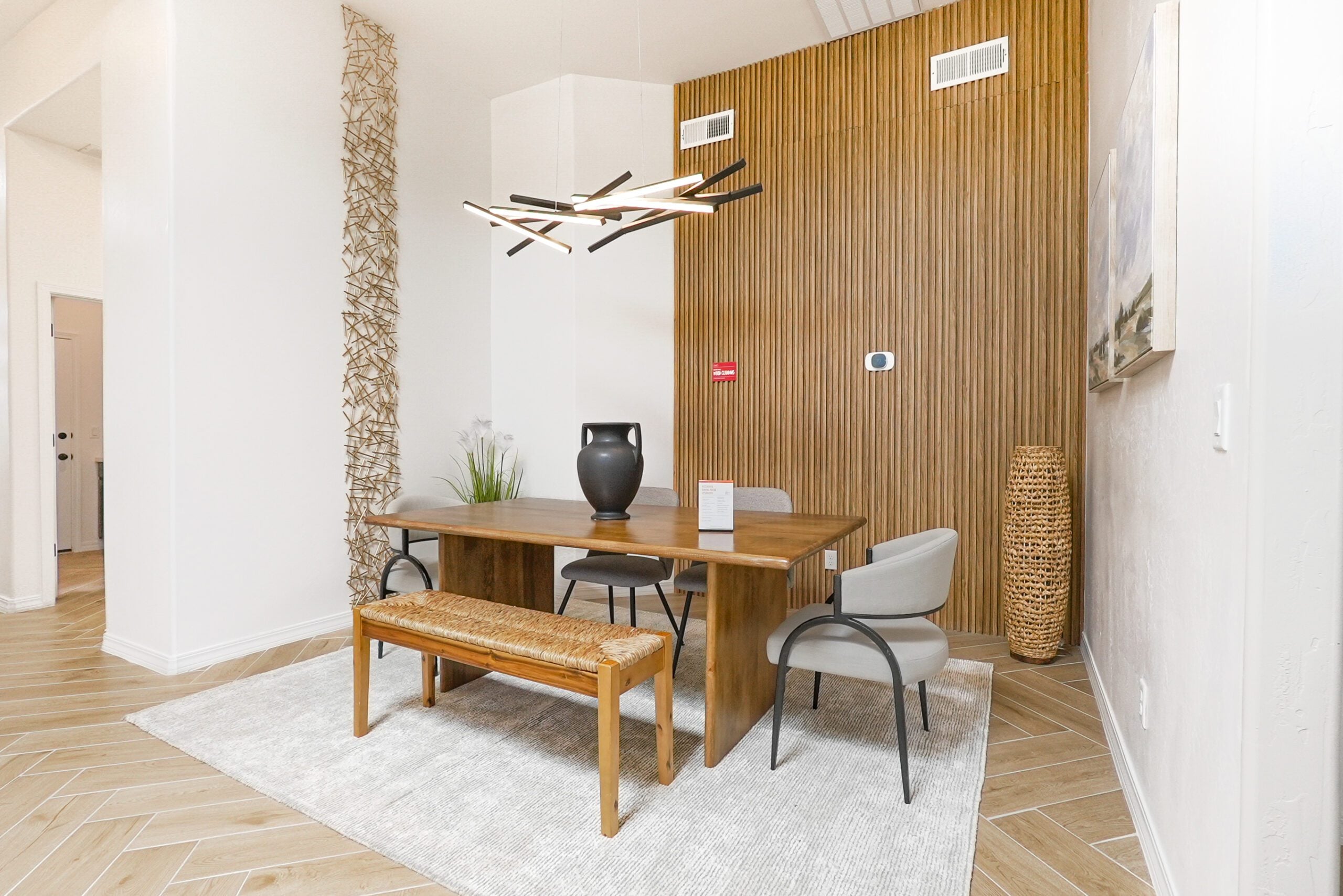 Large dining space in the tulip with wood cladding and modern finishes
