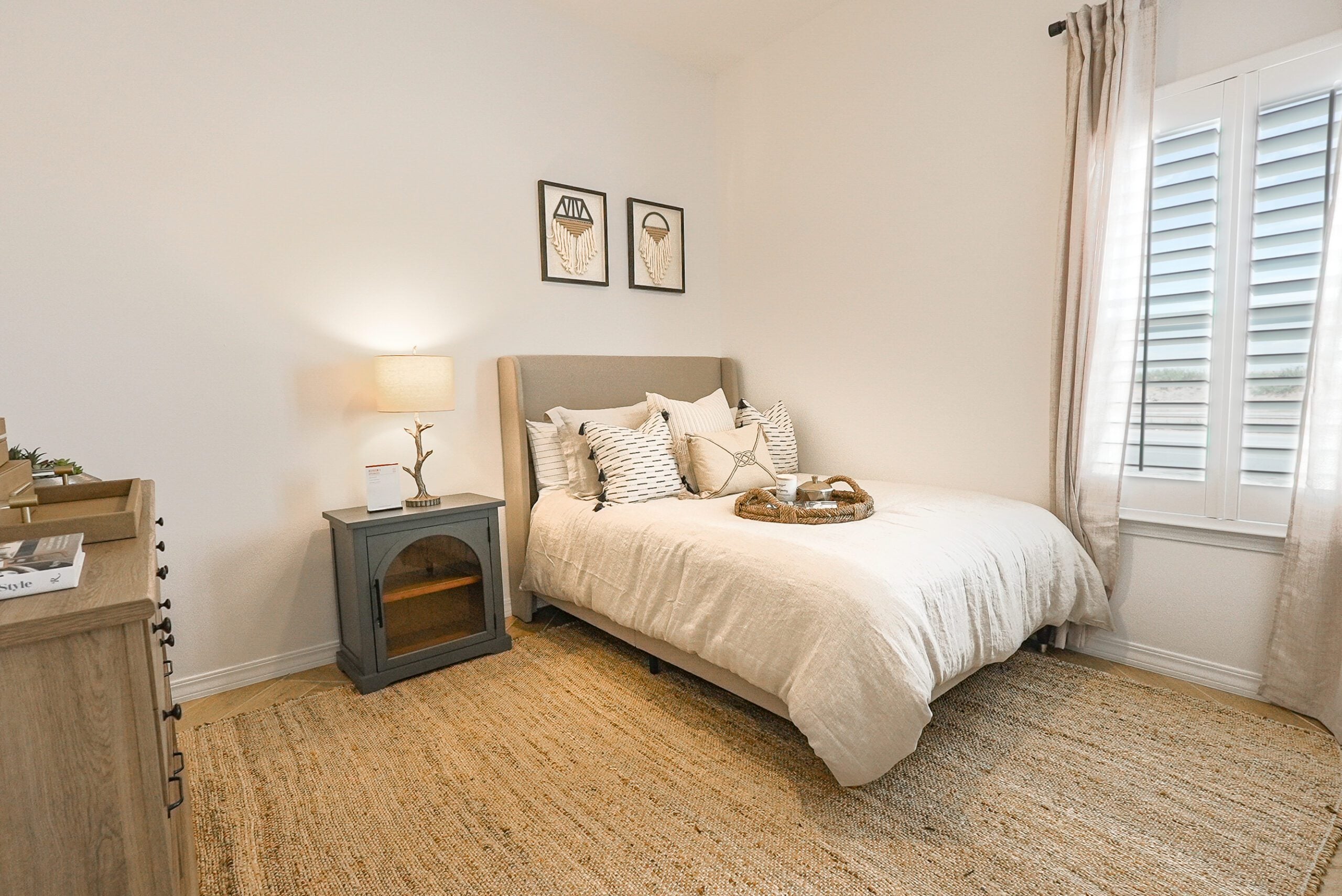 Tulip Bedroom with full bed and modern interior.