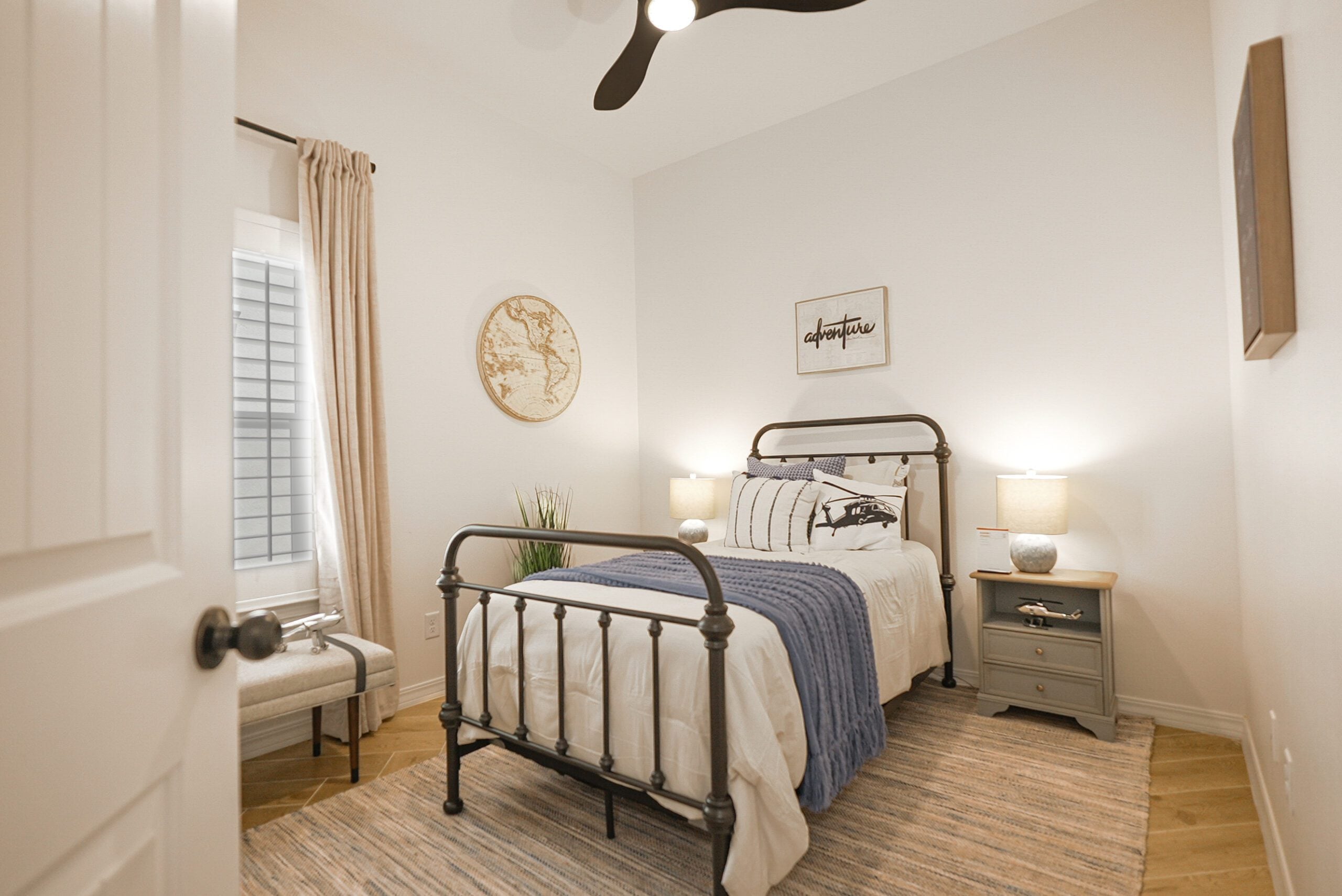 Tulip Bedroom with full bed and modern interior.