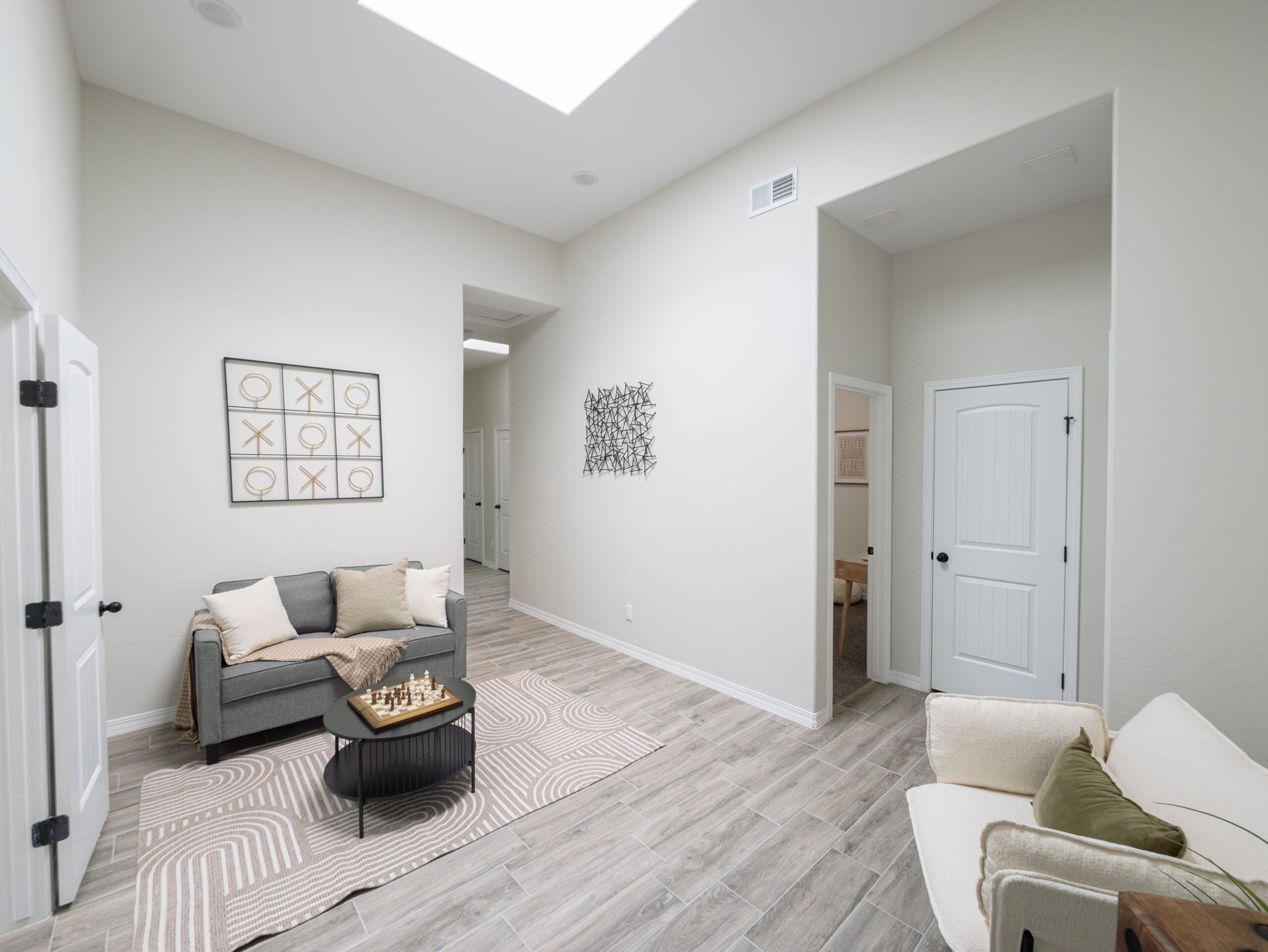 The Chai Game Room with a skylight for natural lighting.