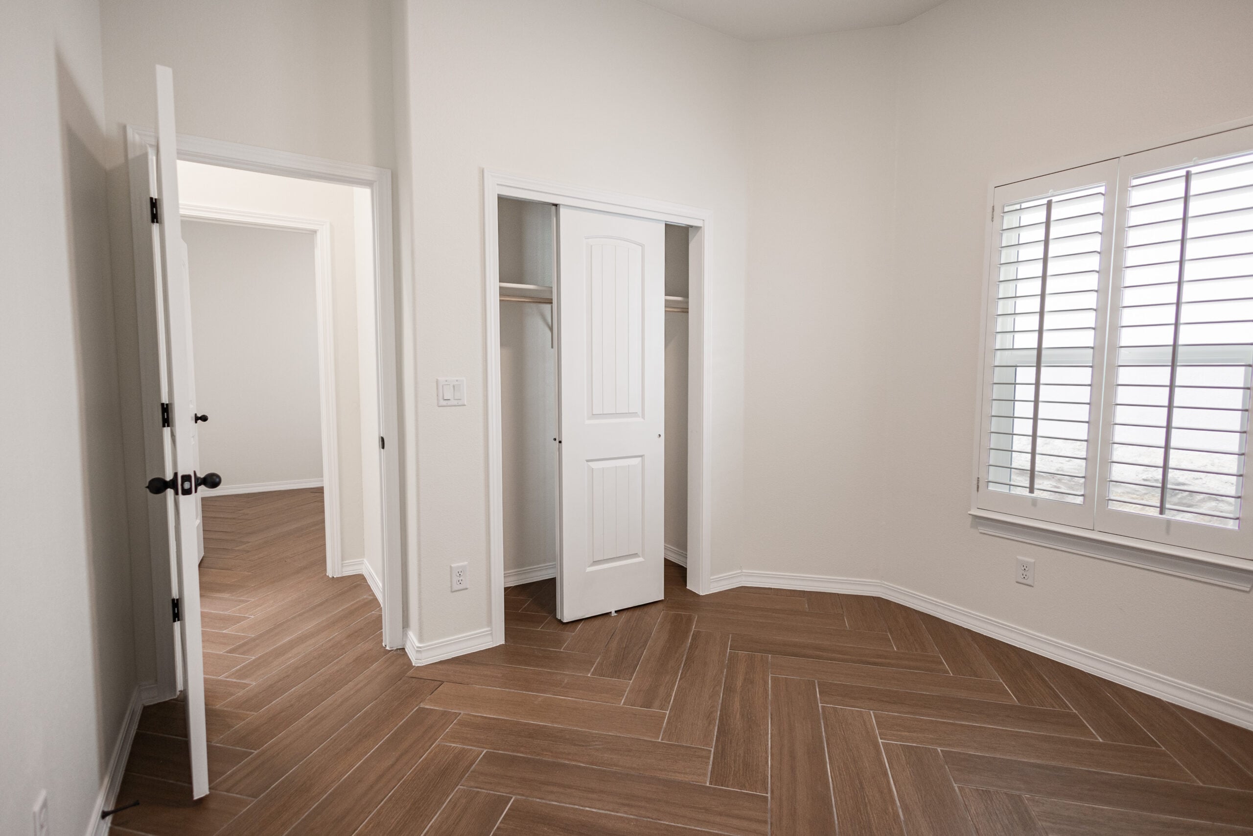 The Daisy Bedroom with a window.